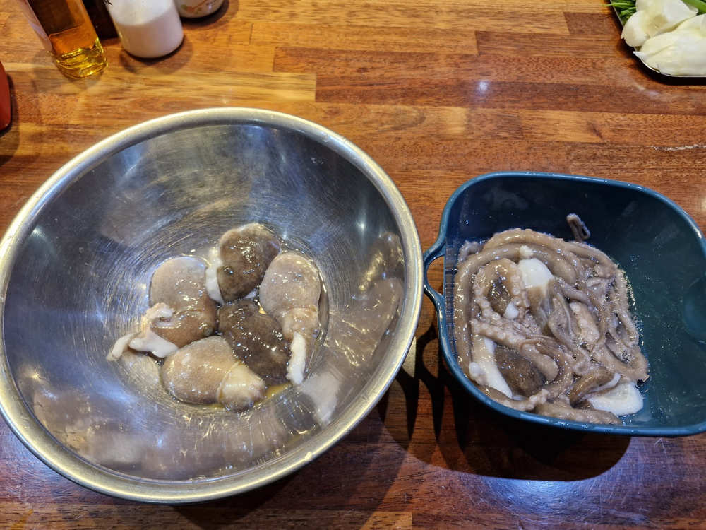 Rinsing the octopus under cold running water