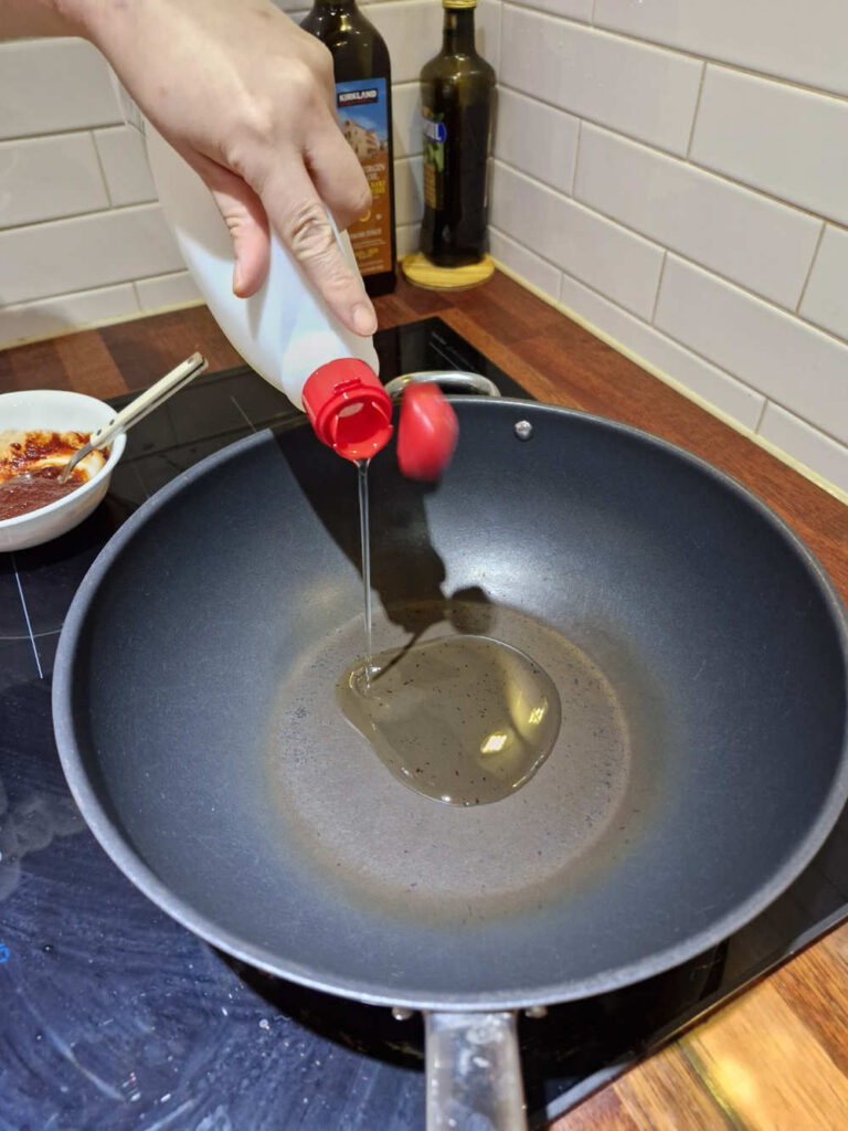Onions and chilies sizzling in a pan