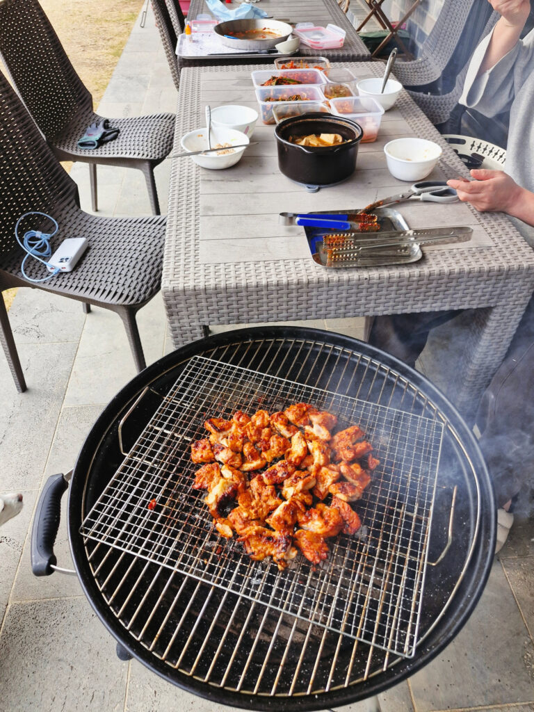 A delicious **Korean BBQ Chicken Recipe** grilled to perfection over charcoal.