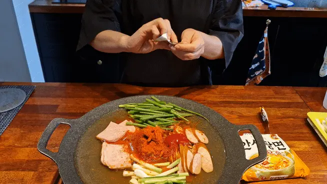 Adding half a packet of ramen soup powder