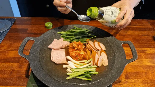 Adding 1 tablespoon of Yondu liquid seasoning