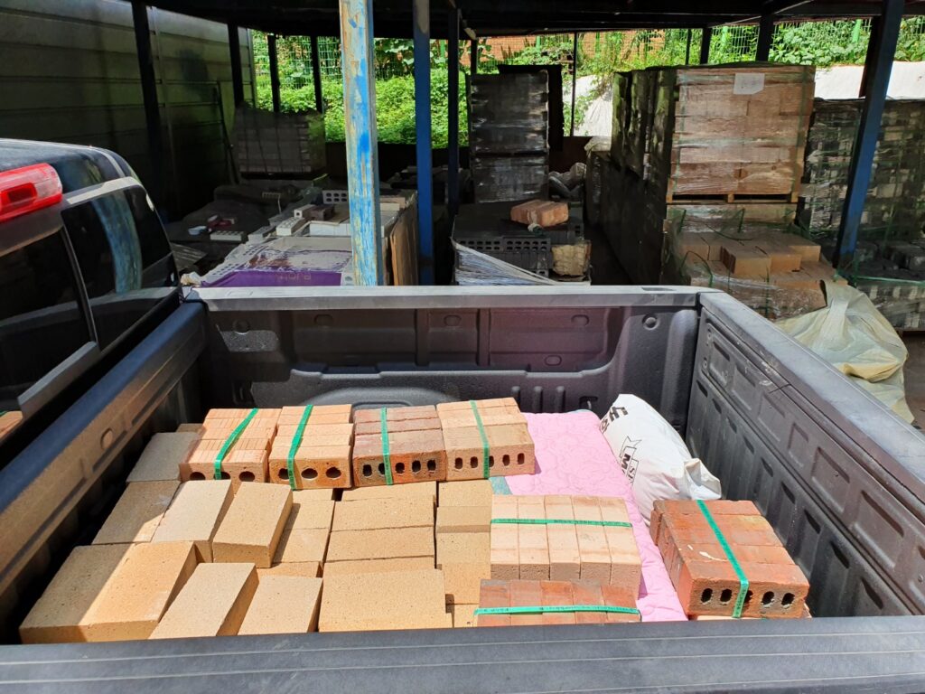 hauling.jpg	Firebricks and building materials for a homemade pizza oven in a truck.