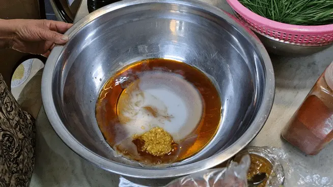 Adding minced ginger for aroma