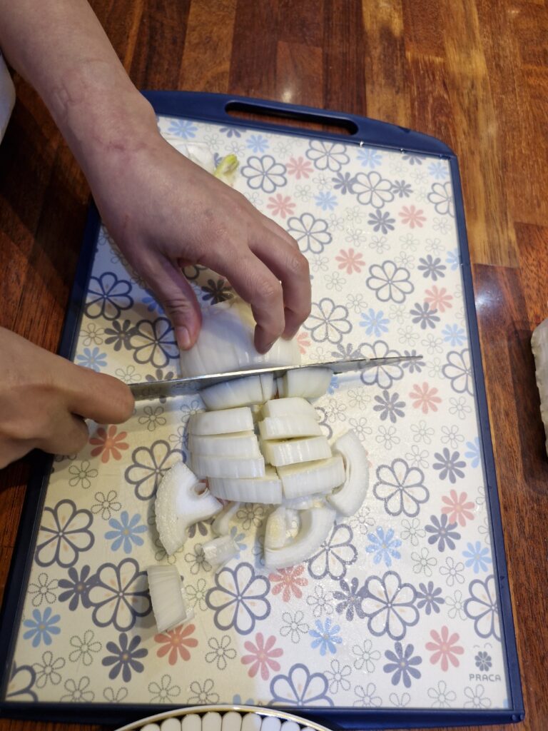 Preparing onions for Doenjang-jjigae